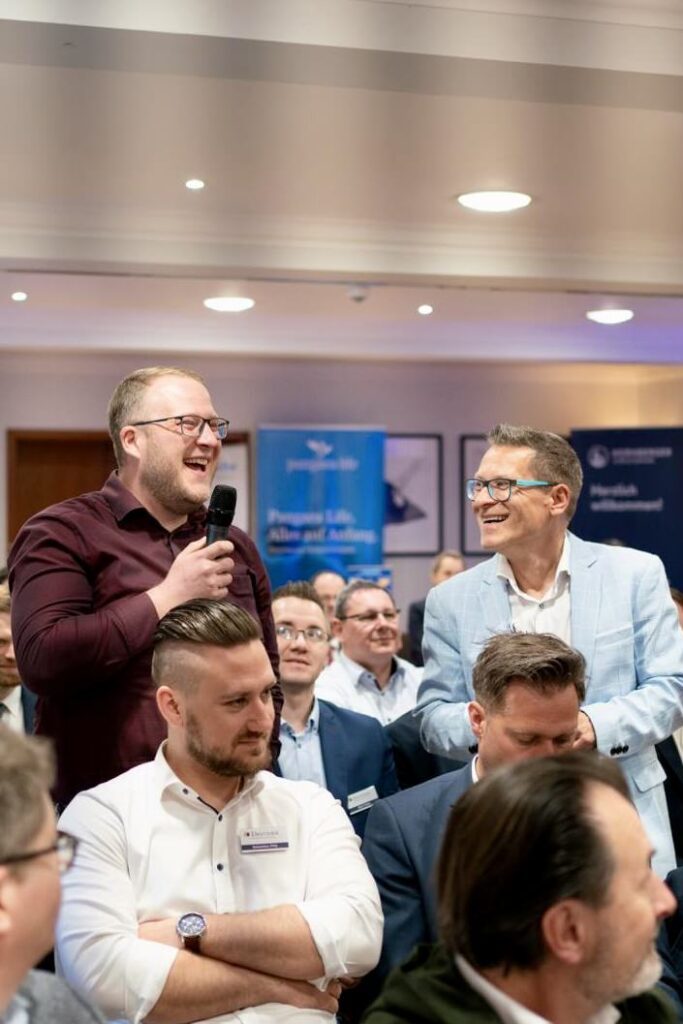 Event Moderator im Publikum